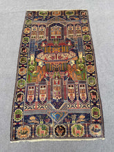 Pictorial hand knotted tribal wool rug