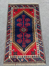 hand-knotted tribal wool bohemian rug