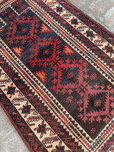 Unique vintage afghan rug