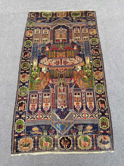 Pictorial hand knotted tribal wool rug