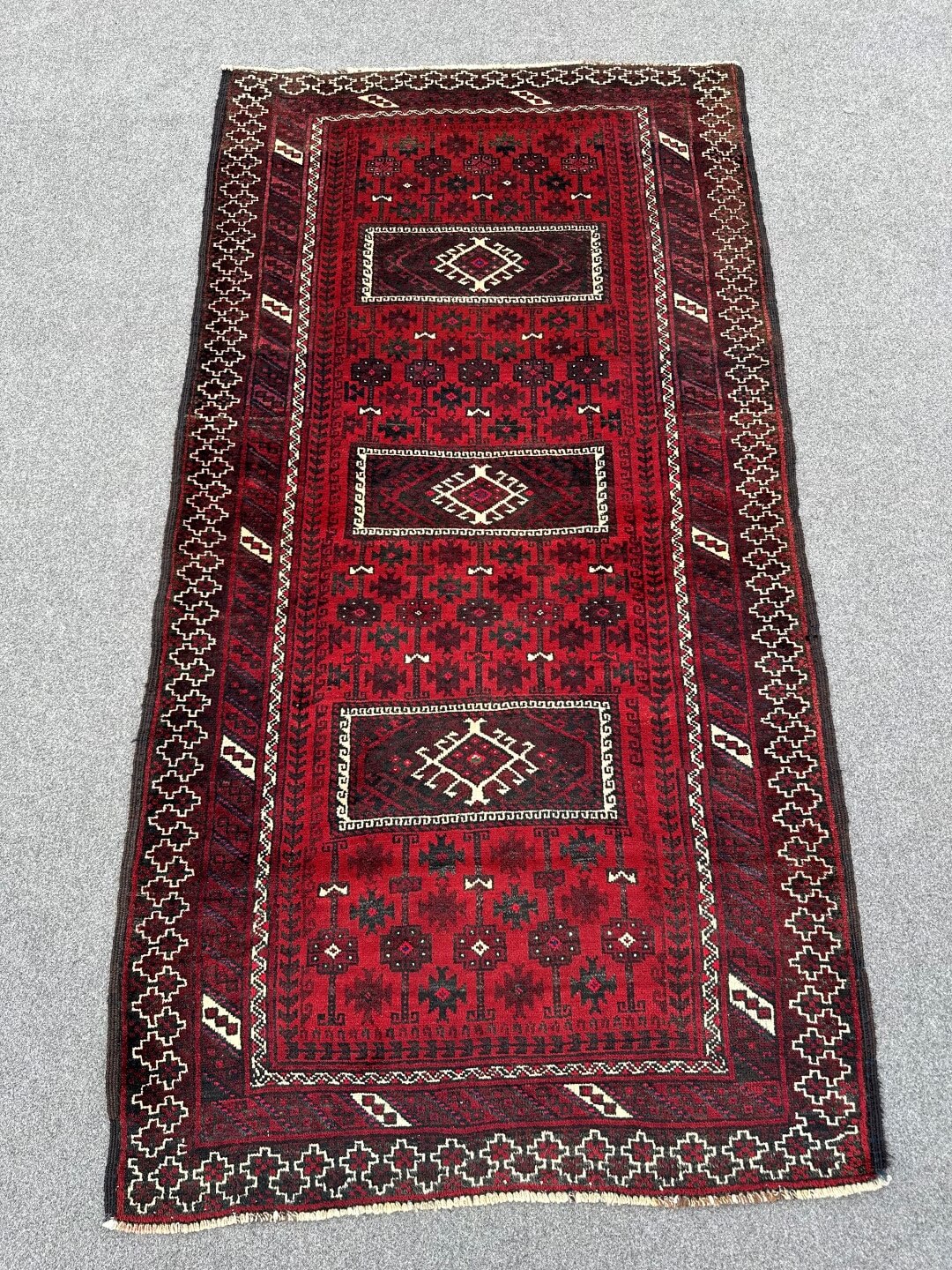 Belouch hand knotted tribal wool rug 