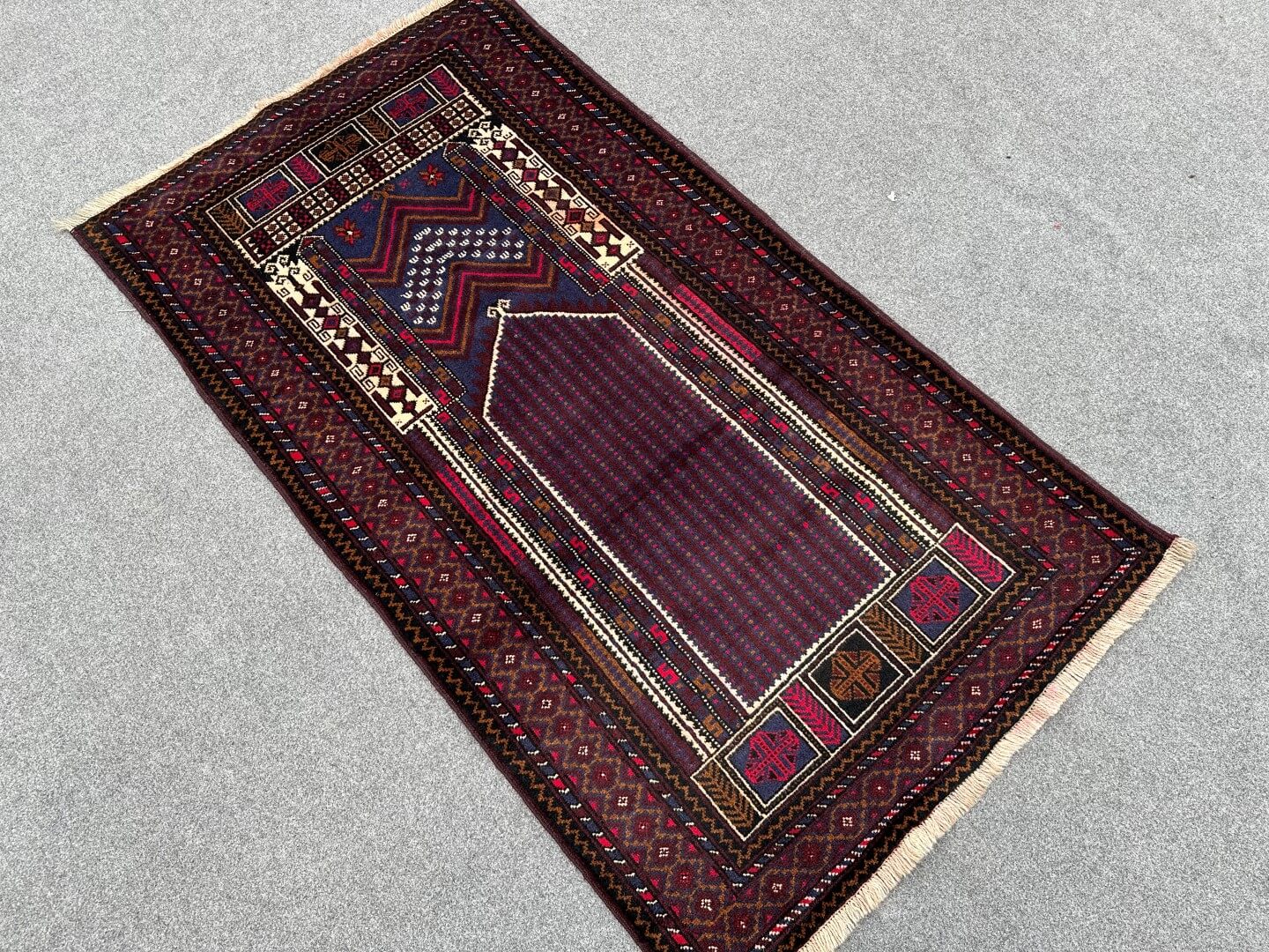 Handmade Afghan prayer rug in burgundy, brown, and beige - Nomad Hues