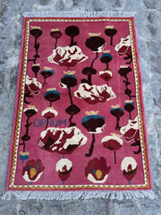 Afghan traditional handmade rug with opium design in pink, red, white, blue, and black, 2.10 x 3.11 feet.