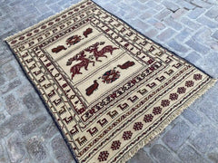 Afghan Soumak Kilim - Beige with Brown Animal Patterns - Nomad Hues